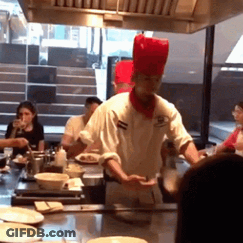 Chef With Red Hat Cooking GIF