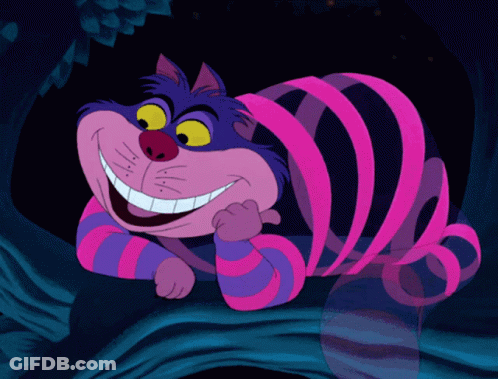 Cheshire Cat Smiling On Tree Branch GIF