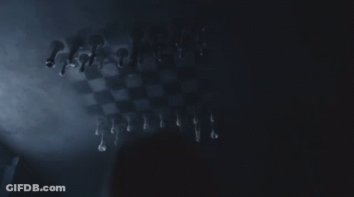 Chess Board With Pieces In Dark GIF