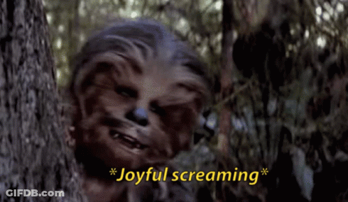 Chewbacca Is Peeking Out From Behind A Tree With The Words Joyful Screaming Above Him GIF