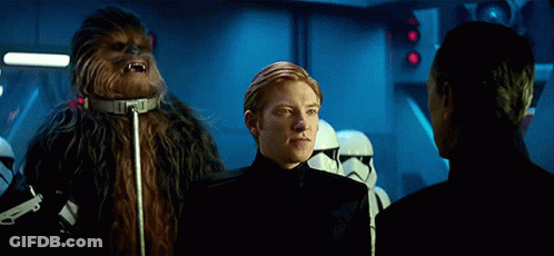 Chewbacca Standing Next To Two Men GIF