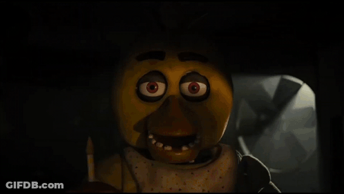 Chica The Chicken From Five Nights At Freddy 'S Is Holding A Pencil In Her Hand In The Dark . GIF