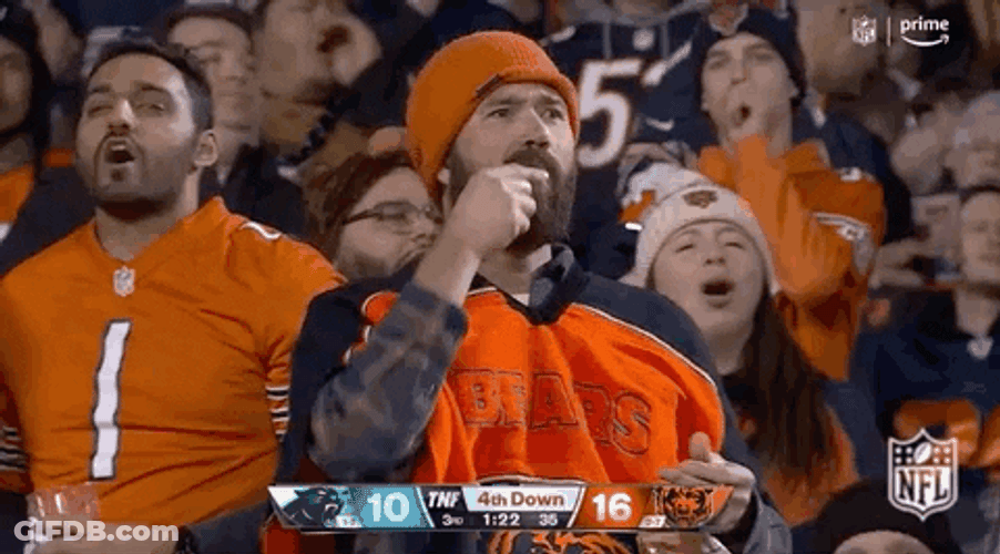 Chicago Bear Fan Chewing Down Food GIF