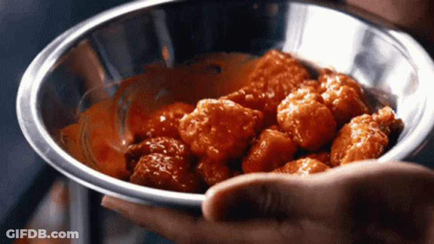 Chicken Wing In A Bowl Smothered With Sauce GIF
