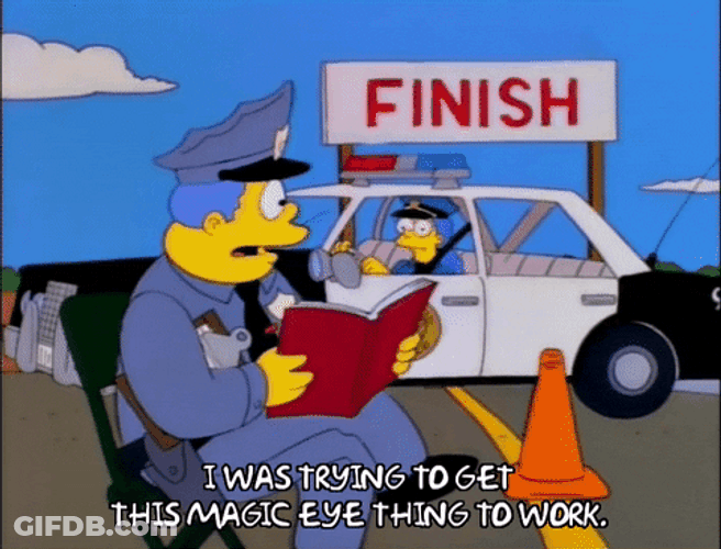 Chief Wiggum Watching The Finish Line GIF