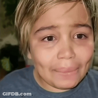 Child Close Up With Blue Shirt GIF