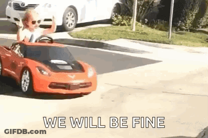 Child Driving Red Toy Car GIF