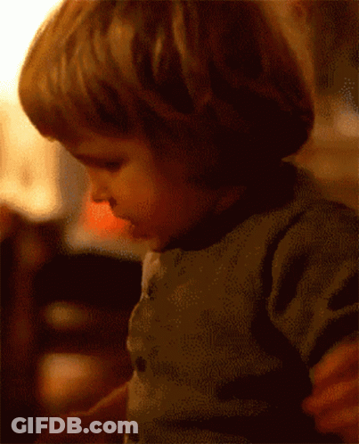 Child Face Behind Just Win Sign GIF