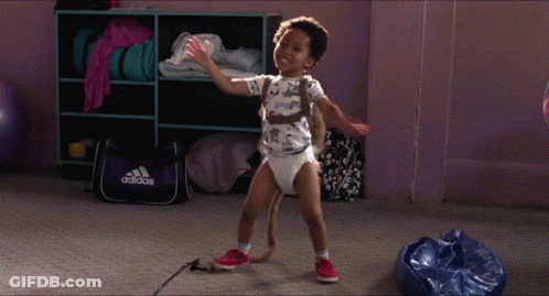 Child In Diaper Dancing In Front Of Adidas Bag GIF