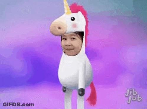 Child In Unicorn Costume With Rainbow Tail GIF