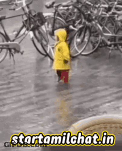 Child In Yellow Raincoat Walking In Rain Starttamilchat GIF