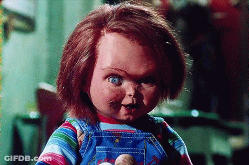 Child's Doll With Red Hair GIF