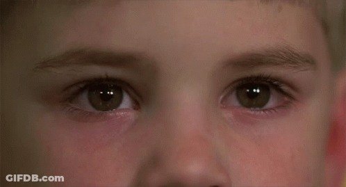 Child's Eyes With Red Eye GIF