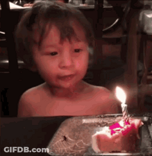 Child Sticking Tongue Out Birthday Candle GIF