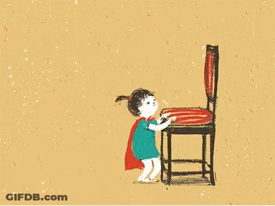 Child Wearing Cape And Chair GIF