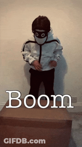 Child Wearing Mask Standing On Boom Box GIF