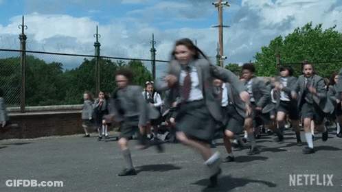 Children In School Uniforms Running GIF