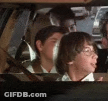 Children Looking Out Car Window GIF