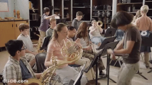 Children Playing Instruments In Classroom With Number 6 GIF