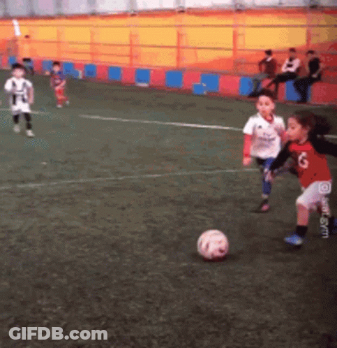 Children Playing Soccer Number 6 On Shorts GIF