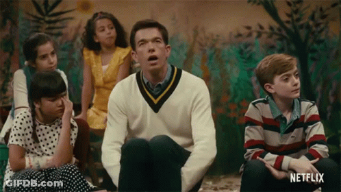 Children Sitting Around Man With Netflix Logo GIF