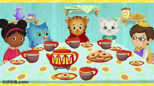 Children Sitting Around Table With Tea Cups And Cookies GIF