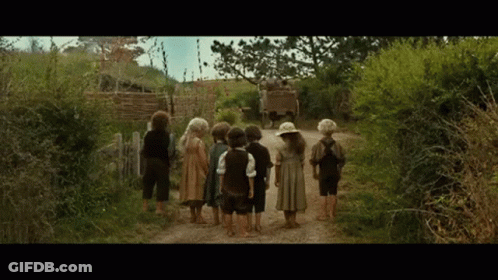 Children Standing On Dirt Path GIF