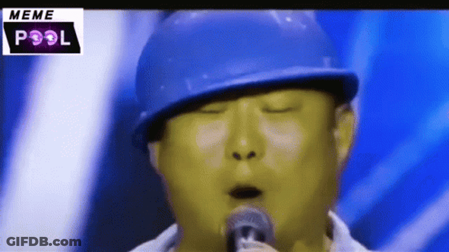 Chinese Man Singing Wearing Blue Helmet GIF