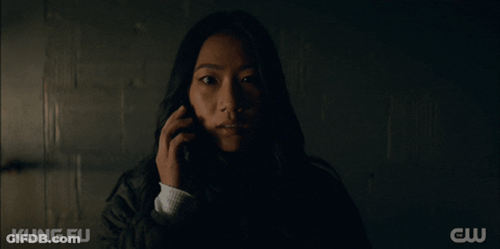 Chinese Woman Ending Phone Call GIF