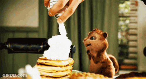 Chipmunk Looking At Pancakes With Whipped Cream GIF
