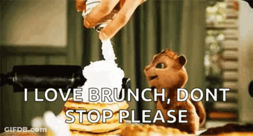 Chipmunk Sitting Next To Pancakes With Whipped Cream GIF
