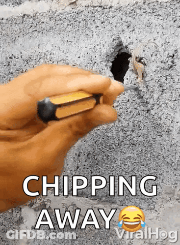 Chipping Hole In Concrete Wall GIF