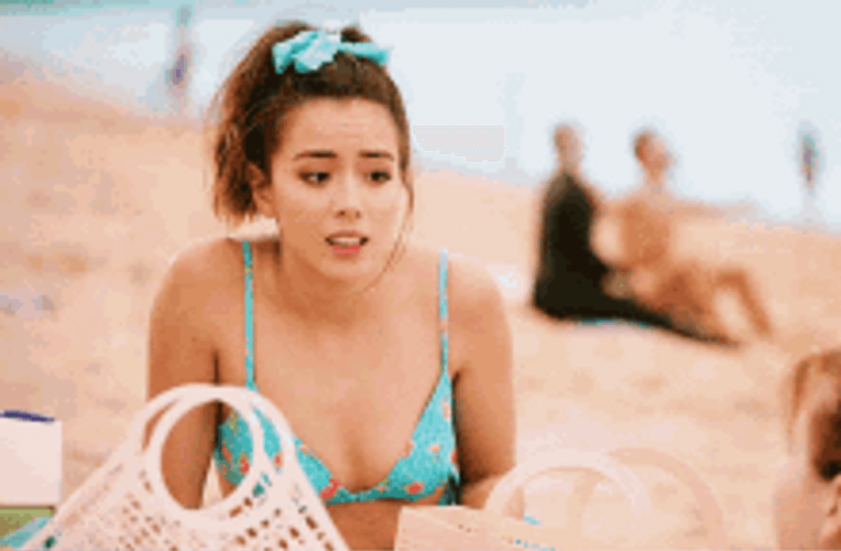 Chloe Bennet Bikini Chilling At The Beach GIF