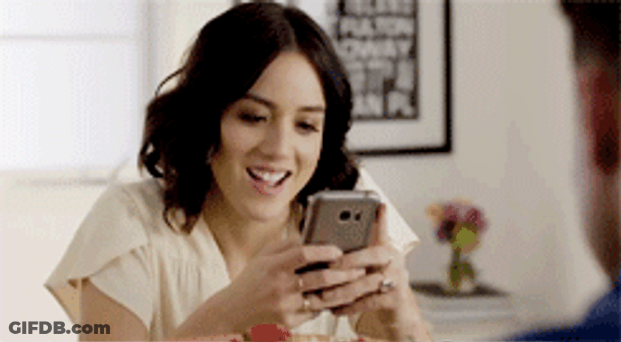 Chloe Bennet Texting On Her Phone GIF