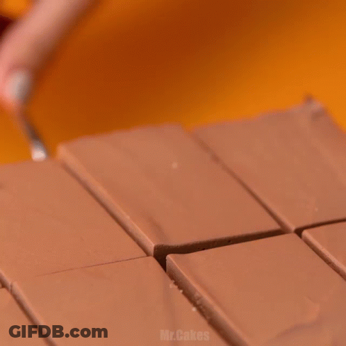 Chocolate Cake On Wooden Board With Mr.cakes GIF