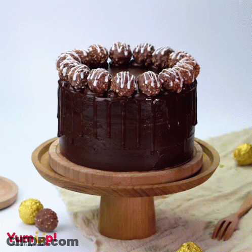 Chocolate Cake On Wooden Stand GIF