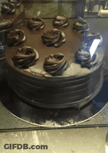 Chocolate Cake With Swirls Of Frosting GIF