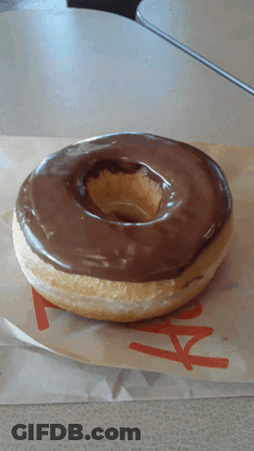 Chocolate Covered Donut On Paper Saying AA GIF