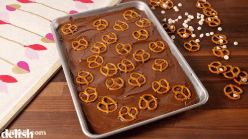 Chocolate Covered Pretzels And Marshmallows Tray Saying Delish GIF