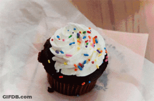 Chocolate Cupcake With Whipped Cream And Sprinkles GIF