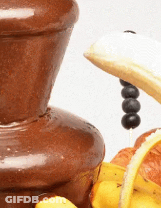 Chocolate Fountain With Dipping Banana GIF