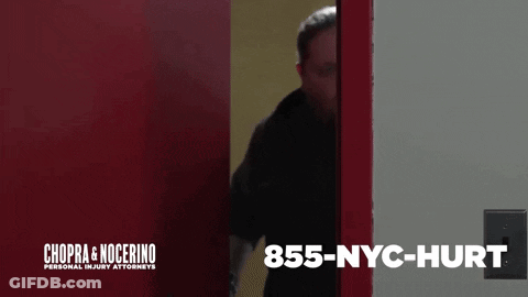 Chopra & Nocerino Personal Injury Attorneys Man Peeking Out Of Door GIF
