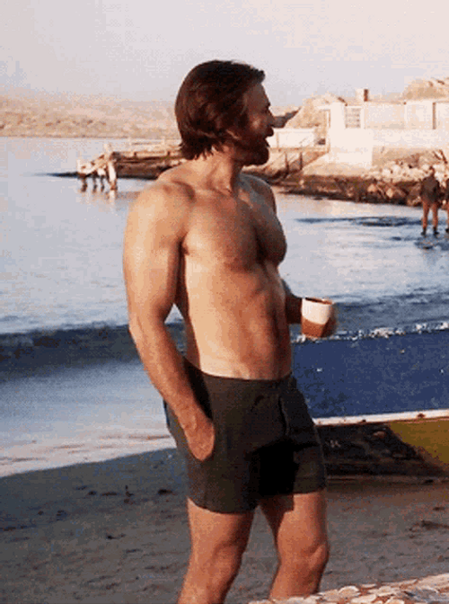 Chris Evans Coffee In Beach GIF