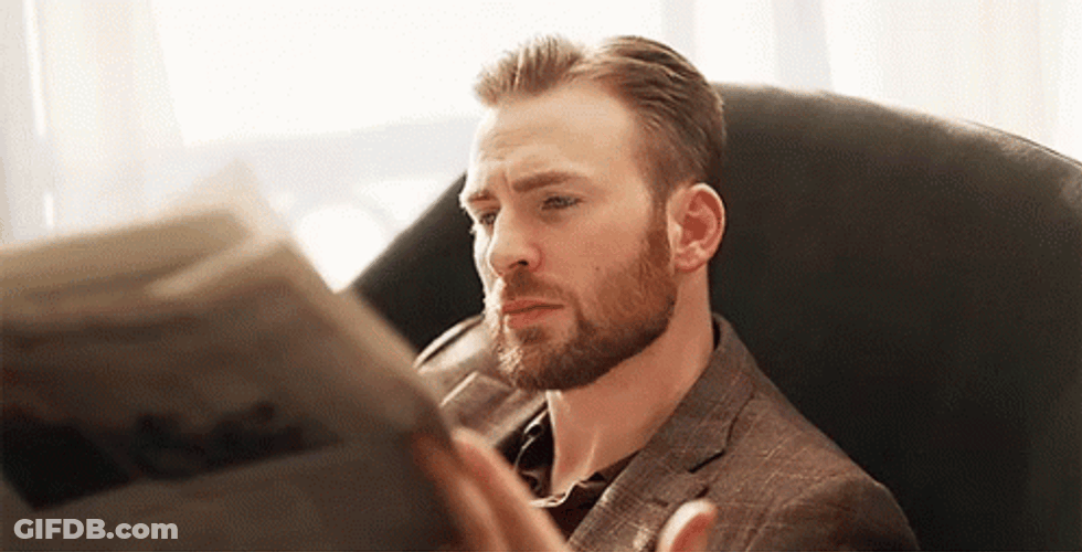 Chris Evans Reading Newspaper GIF