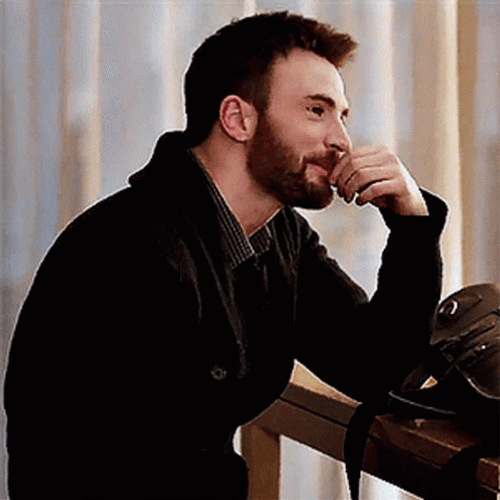 Chris Evans Thinking & Smiling GIF