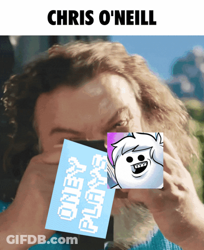 Chris O'neill Is Holding A Picture Of A Yeti In Front Of His Face GIF