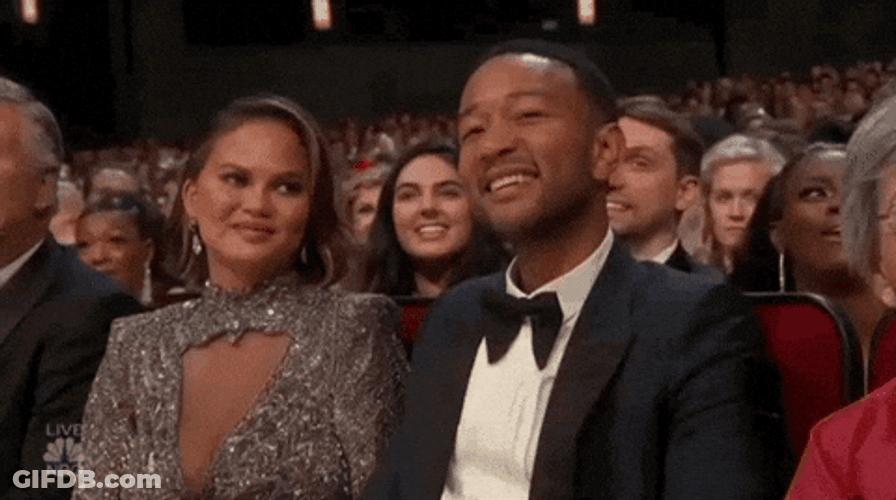 Chrissy Teigen Snickering GIF