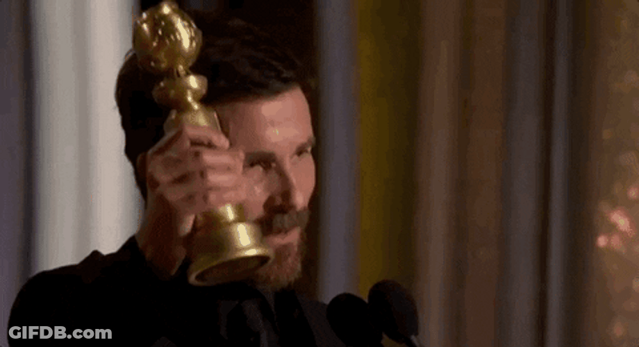 Christian Bale Holding Golden Globe Award GIF