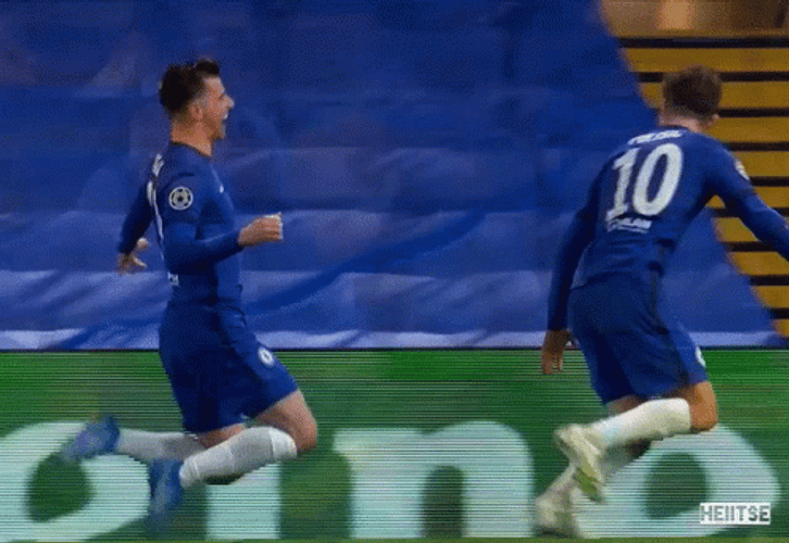 Christian Pulisic Slide Hugging Teammate GIF