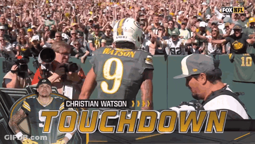 Christian Watson Football Player In Front Of Crowd GIF